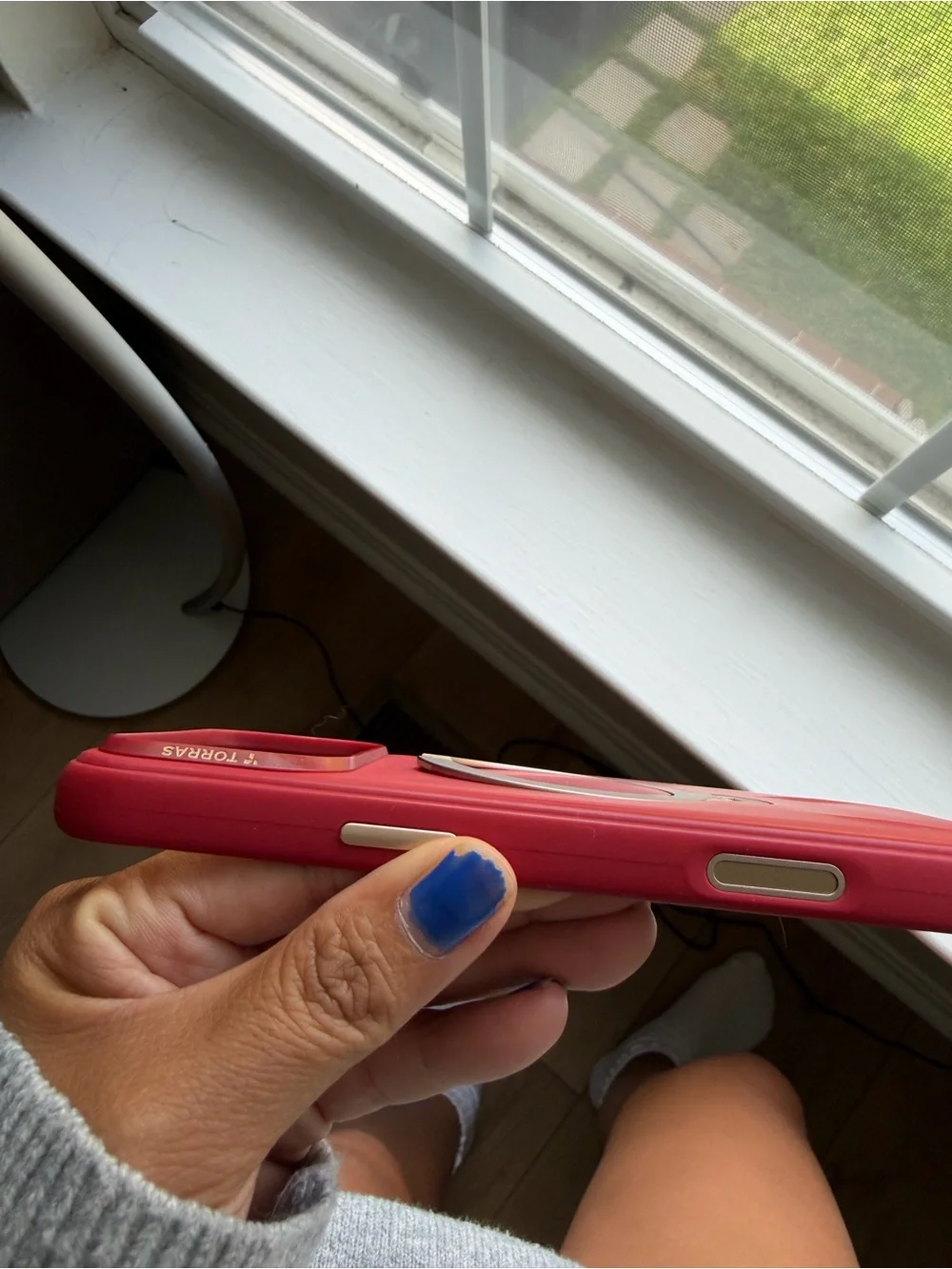 Red iPhone 17 pro max case with ring kickstand